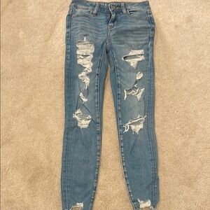 Distressed Blue Jeans